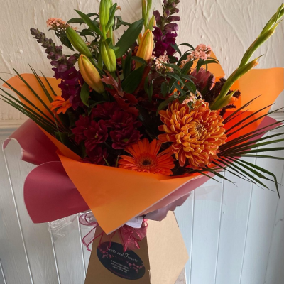 Autumn Days - Rich Autumnal colours and blooms perfectly blended together.

Fine Print: Every bouquet is hand made and delivered by the local florist. Pictures shown are recent examples of an actual arrangement that were designed by talented florists and later sent out to a customer just like you! Please note that each individual florist cannot guarantee what the flower varieties or colours will be, they do guarantee that your specific arrangement will be fresh, beautiful and that your recipient will love it!