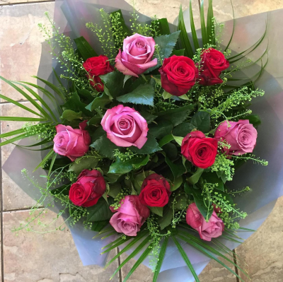 Dozen Pink and Red Roses - At Hearts and Flowers we are delighted to present this product available for flower delivery in Cardiff and surrounding areas