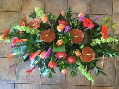 Casket spray - A contemporary modern casket spray, this is bold and simple yet beautiful with exotic blooms.

Available in 3ft, 4ft and 5ft.